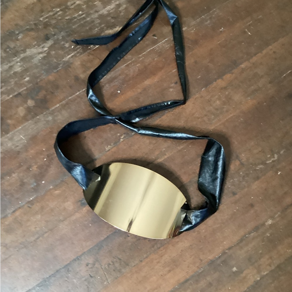 Huge belt buckle with faux leather tie